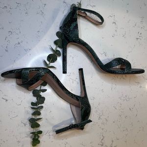 Unique designer heels.Worn 1 time.Bought for a specific outfit.perfect condition